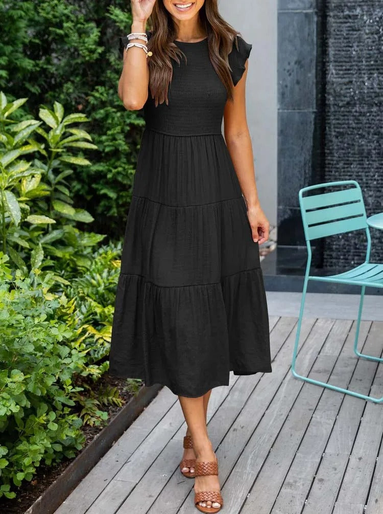 Ronja | Elegant Lagdelt Kjole med Flydende Design