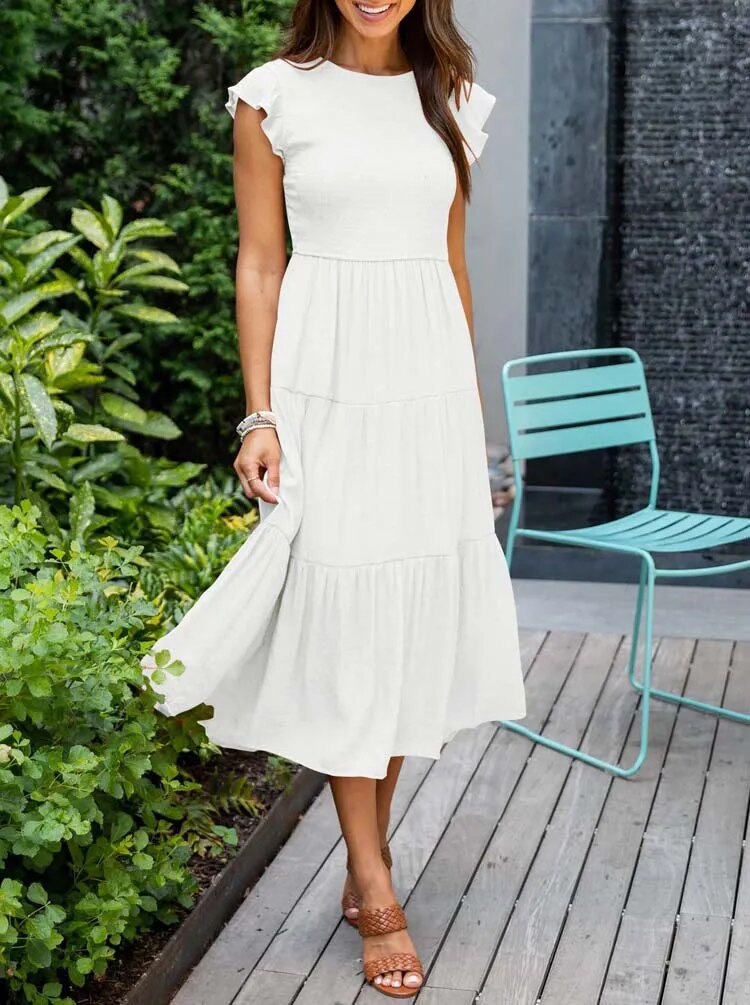 Ronja | Elegant Lagdelt Kjole med Flydende Design